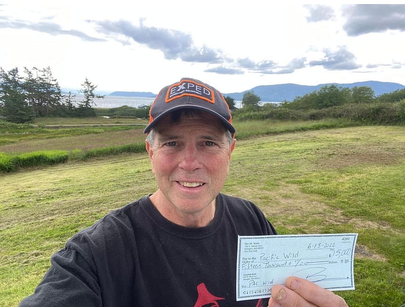 Ben Wells with Wells/Trumbull $15000 cheque